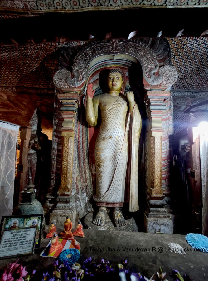 Abhaya mudra of buddha at dambulla rangiri caves Unesco World Heritage Site Sri Lanka