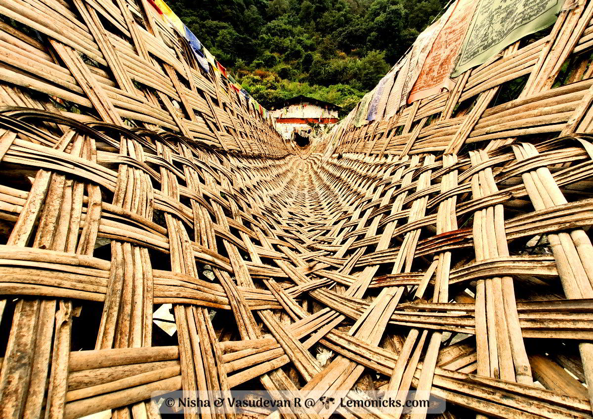 Chakzam Bridge at Tawang, A Stunning Ancient Engineering Marvel Arunachal Pradesh. Strips of bamboo woven into a strong bridge over Iron chains